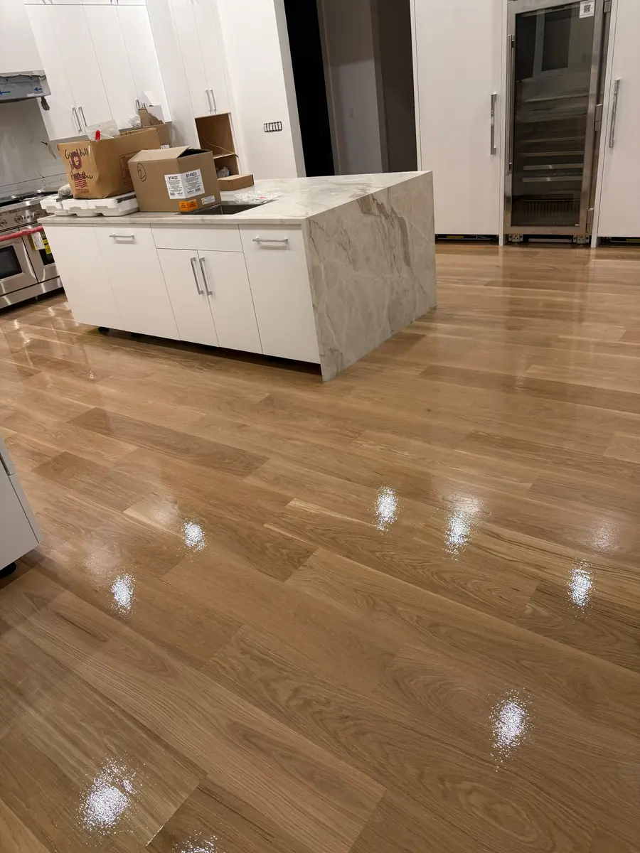 Finished hardwood floor in a kitchen